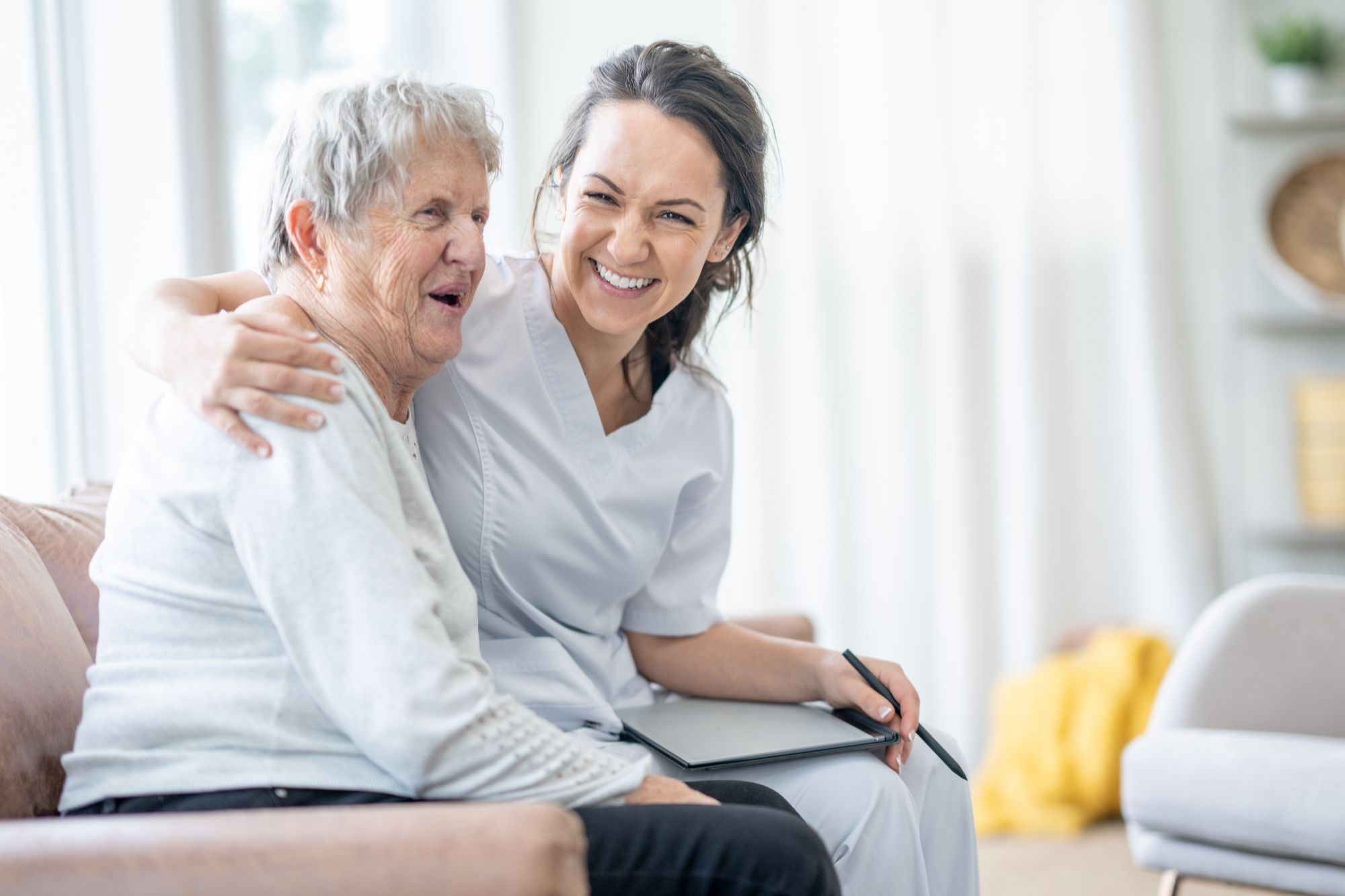 Daily living assistance Toronto, senior care services in Toronto, Caregiver assisting senior with in-home care services in Toronto